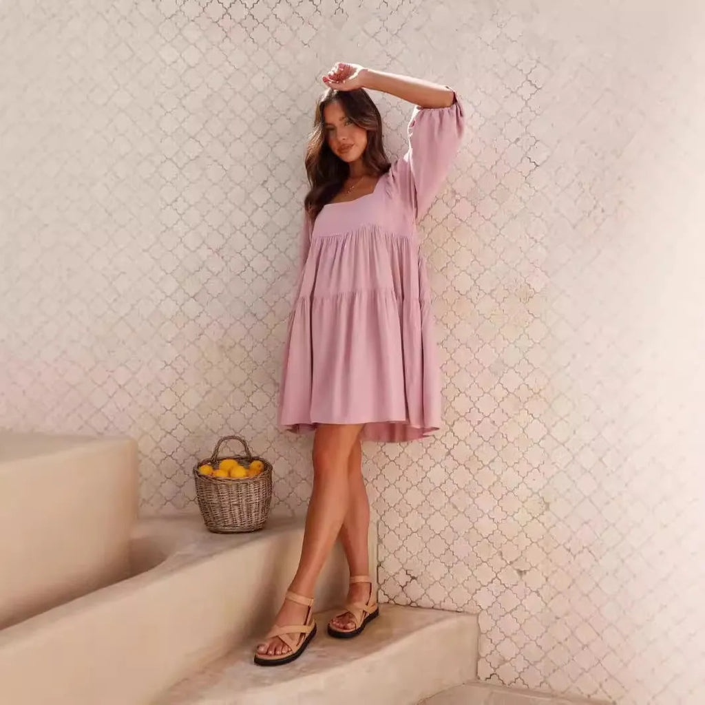 Orange backless children's dress with puff sleeves, a square collar, and a loose A-line skirt.