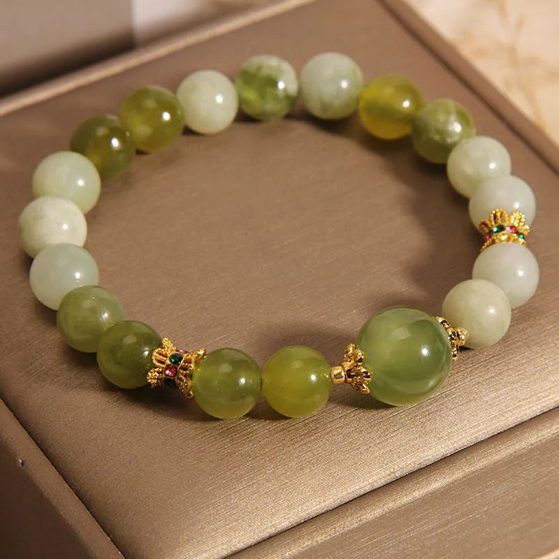 Women's jade bracelet in Xiuyan jade green colour with original design