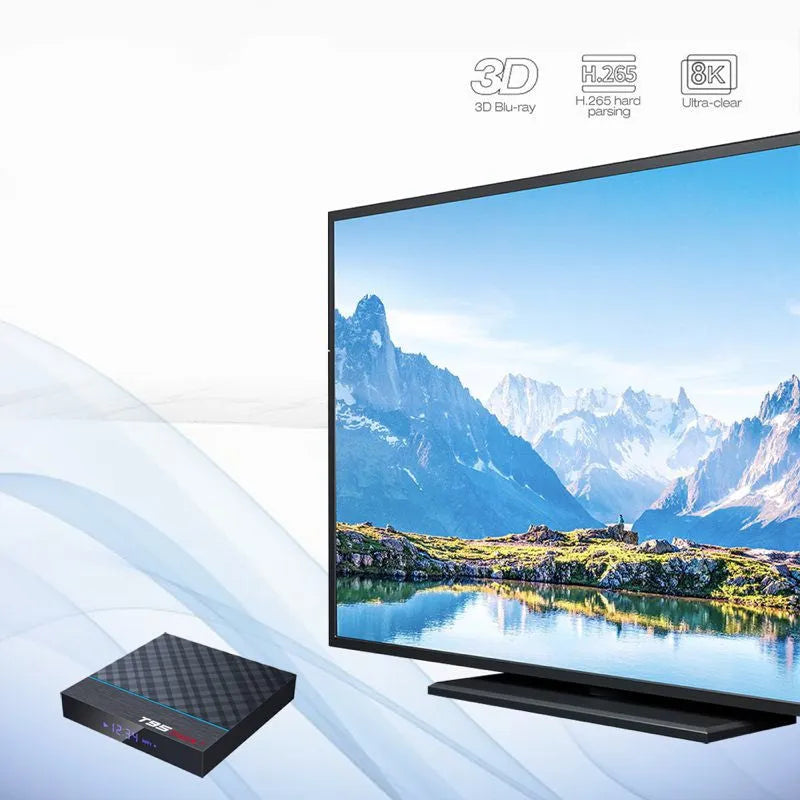 Black T95 Max Plus Android TV box with remote control, showing UK power plug
