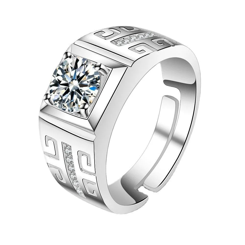 Gold and platinum adjustable copper men's ring on a hand.