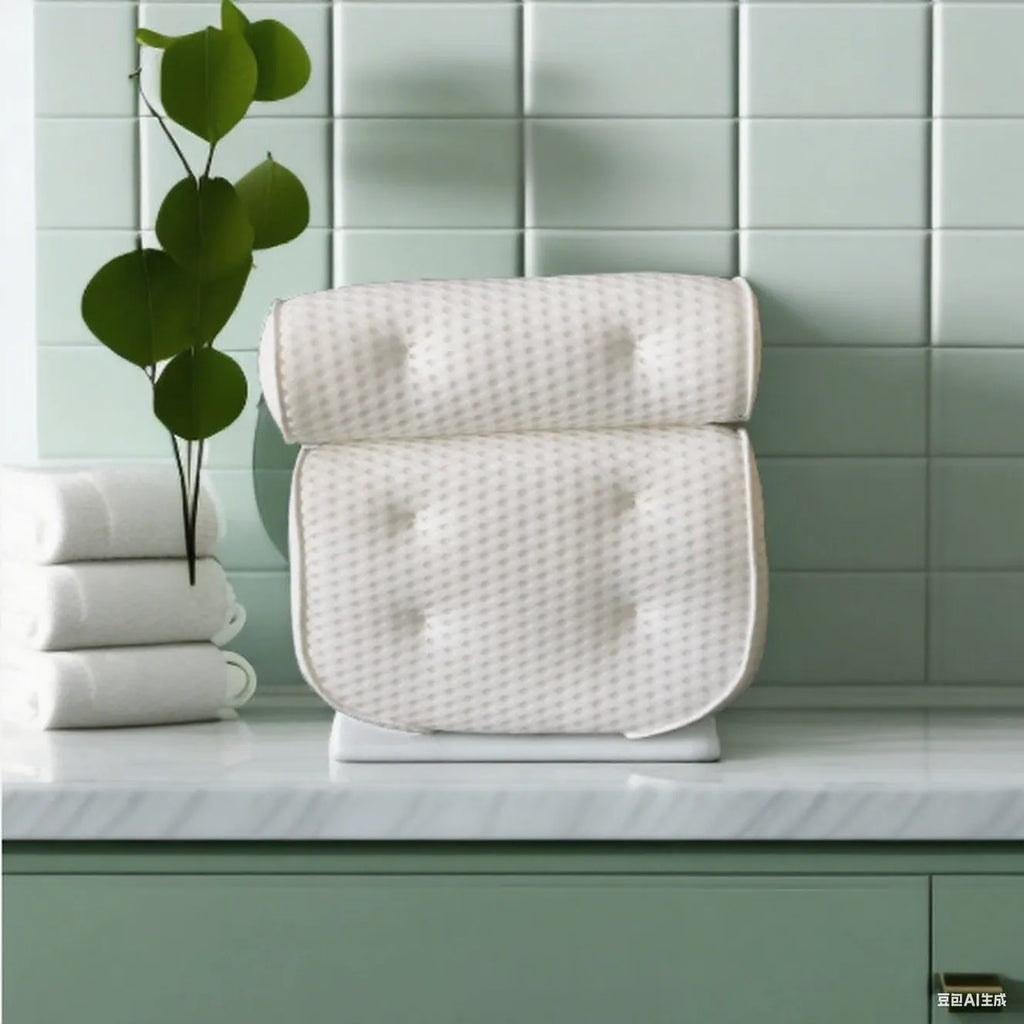 White 4D mesh bathtub pillow with suction cups on a bathtub.