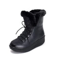 Women's black platform winter boots with lace-up closure and water-resistant PU leather