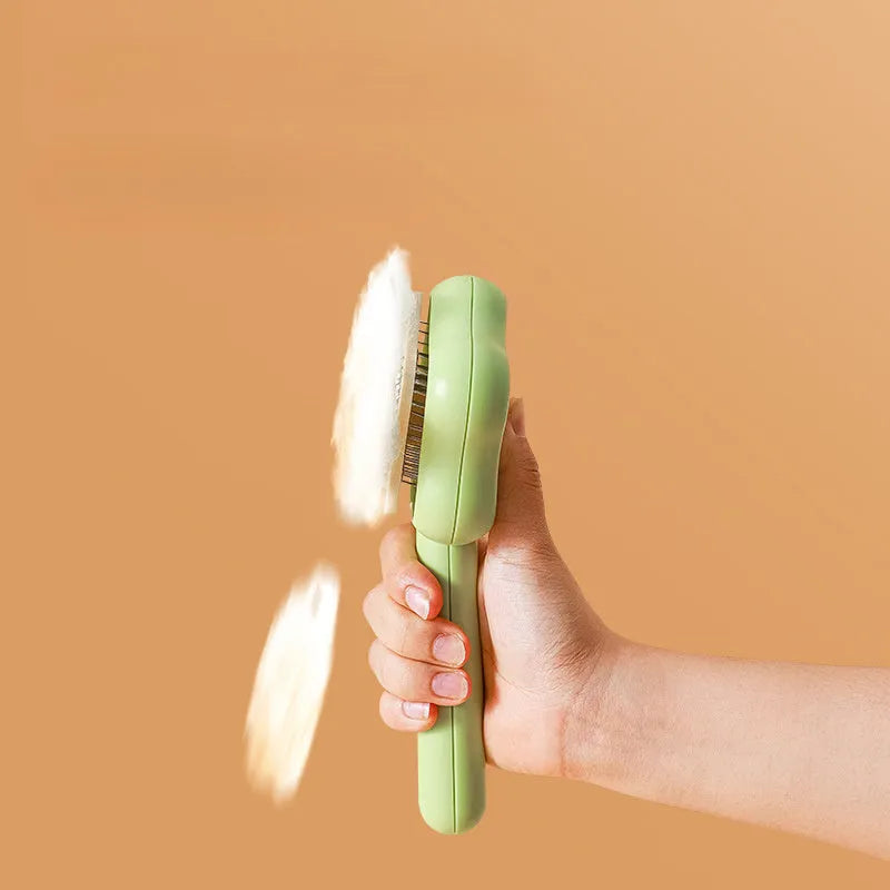 Self-cleaning cat comb with stainless steel needles, green colour, 20cm long pet grooming tool