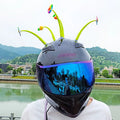 Silicone sunflower helmet decoration with suction cup attachment showing flexible stalk and petals