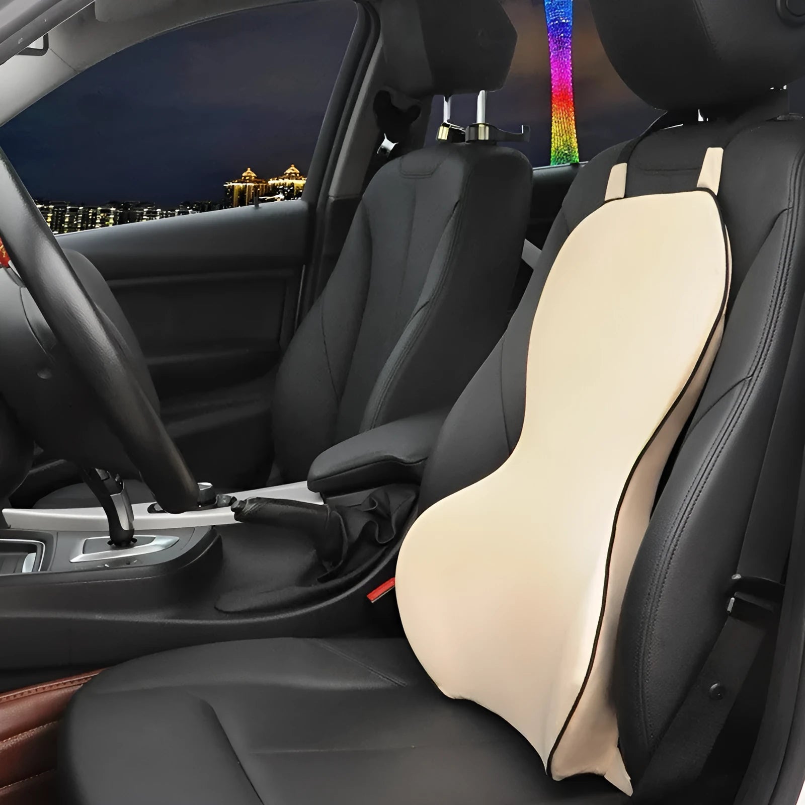Universal memory cotton car lumbar support cushion in solid colour on a car seat.