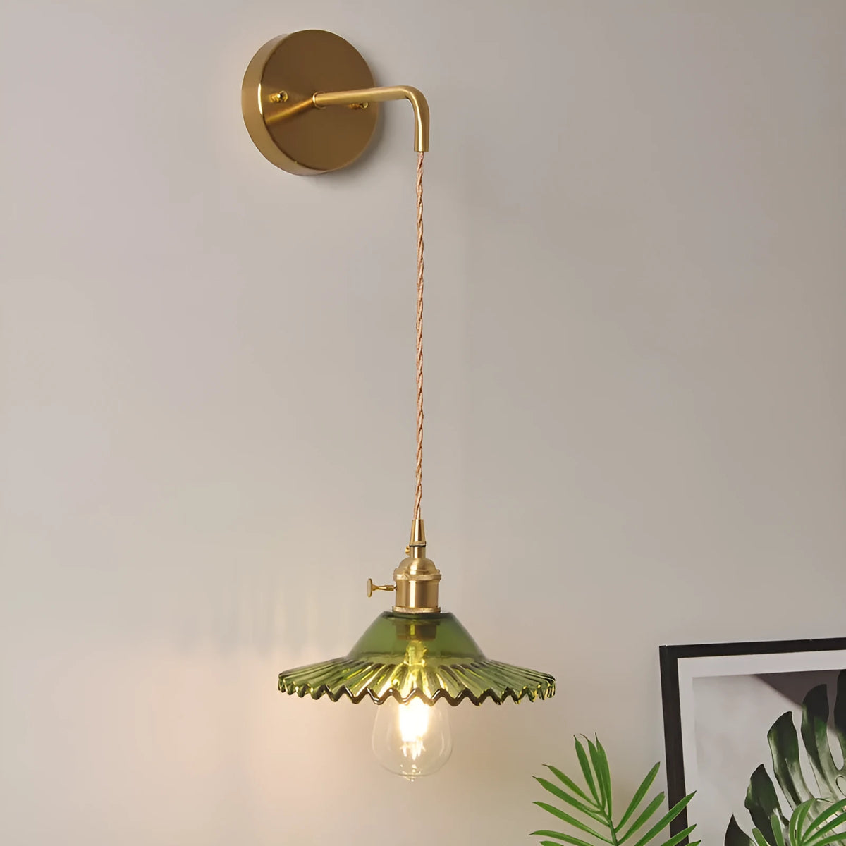 Retro brass bedside lotus wall lamp with glass shade in transparent finish, copper body, 22cm diameter