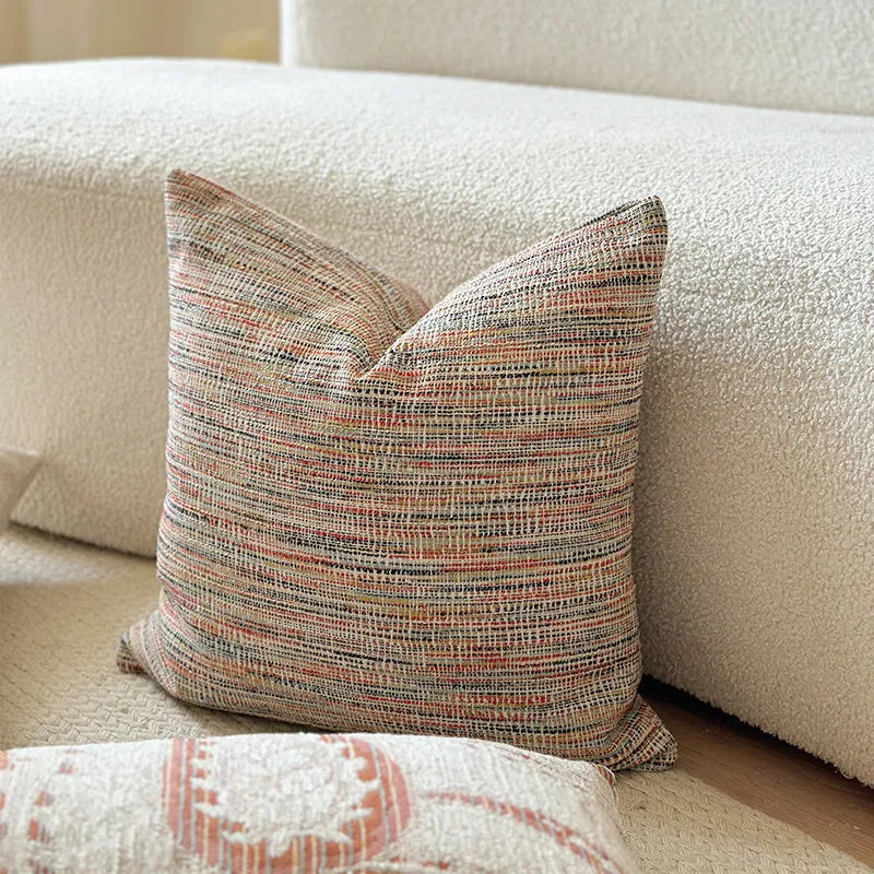 American-style yarn-dyed jacquard sofa cushion with paisley pattern in amber colours