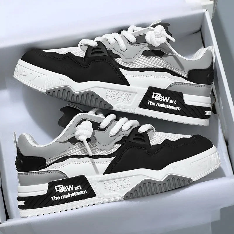 Men's low top white casual shoes with rubber sole and mesh lining in beige, black, or white and yellow.