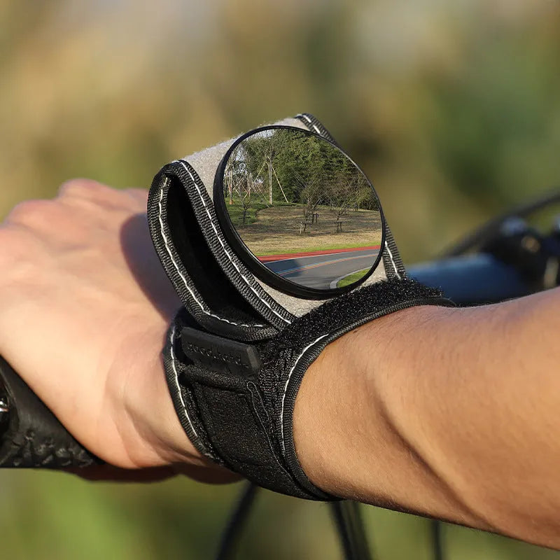 Black nylon wrist-mounted cycling rearview mirror with adjustable arm