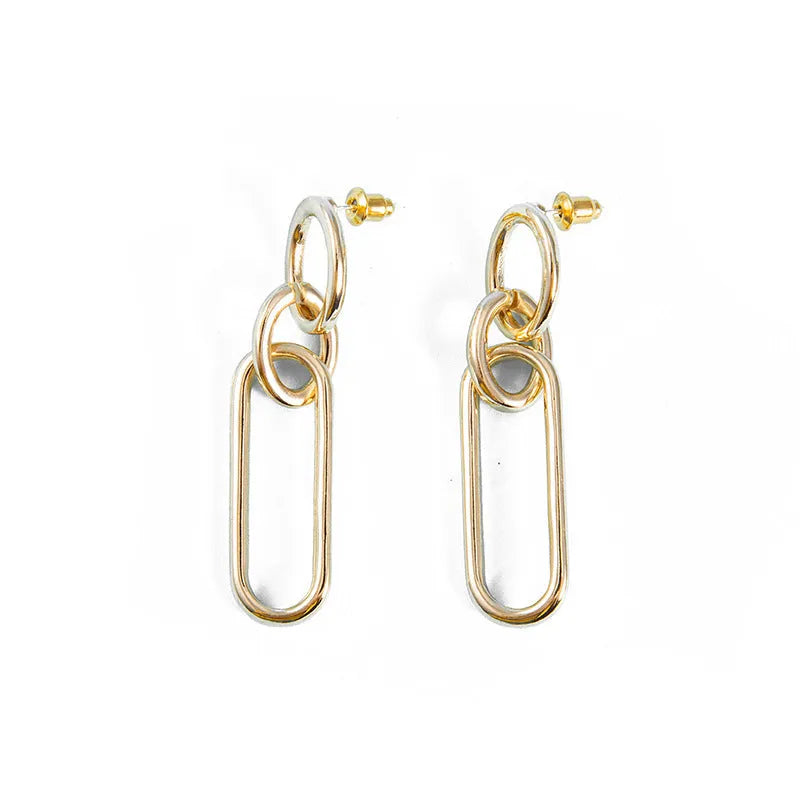 Sterling silver geometric hoop earrings with ring and line design elements