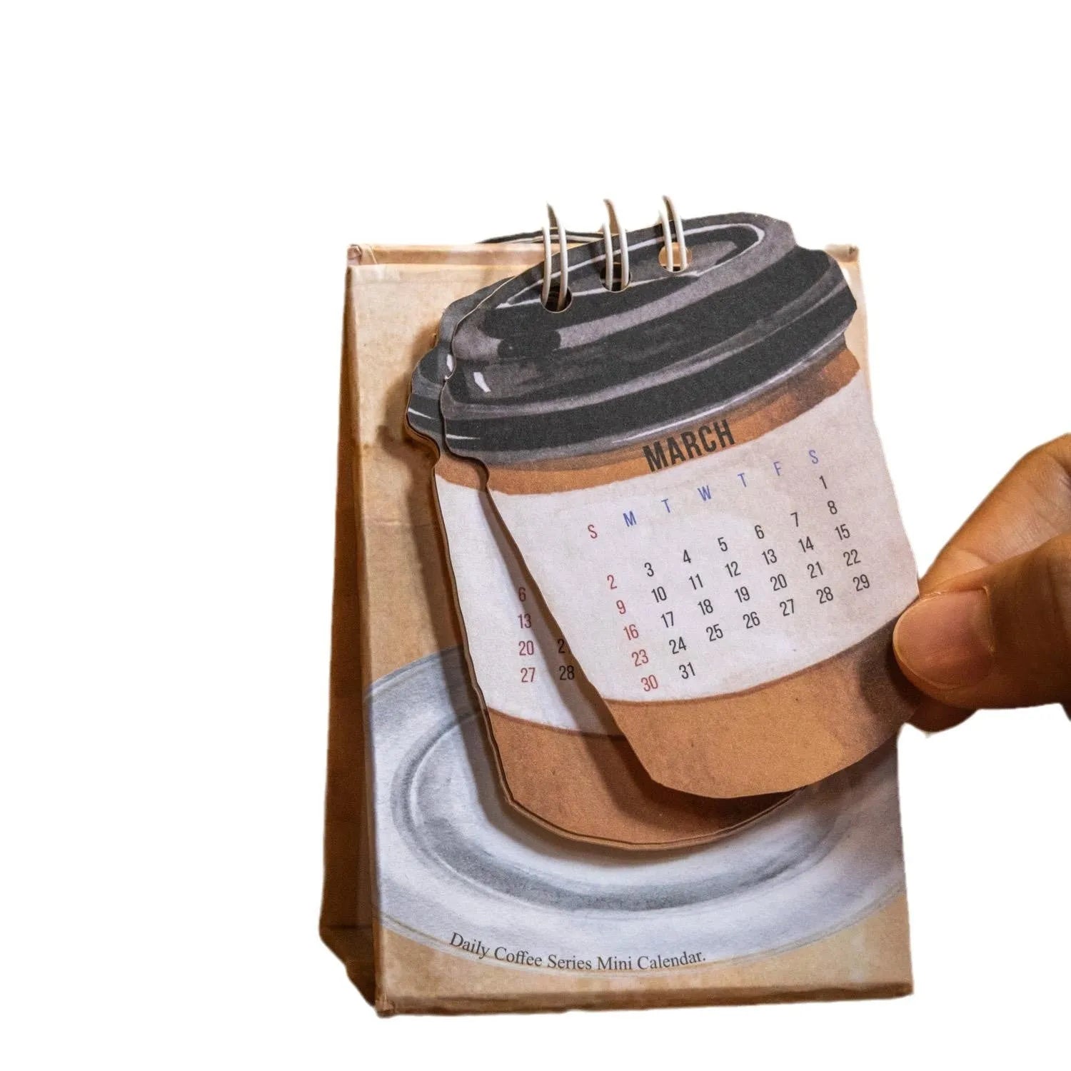 Mini 2025 desk calendar set showing four different themed designs including coffee and motivational messages.