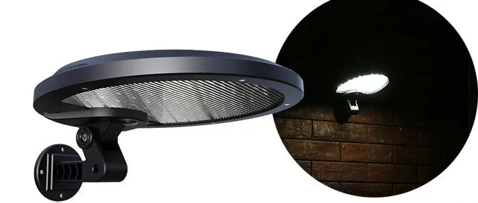 Black outdoor solar wall light with LED panel on a brick wall, IP65 waterproof garden lighting
