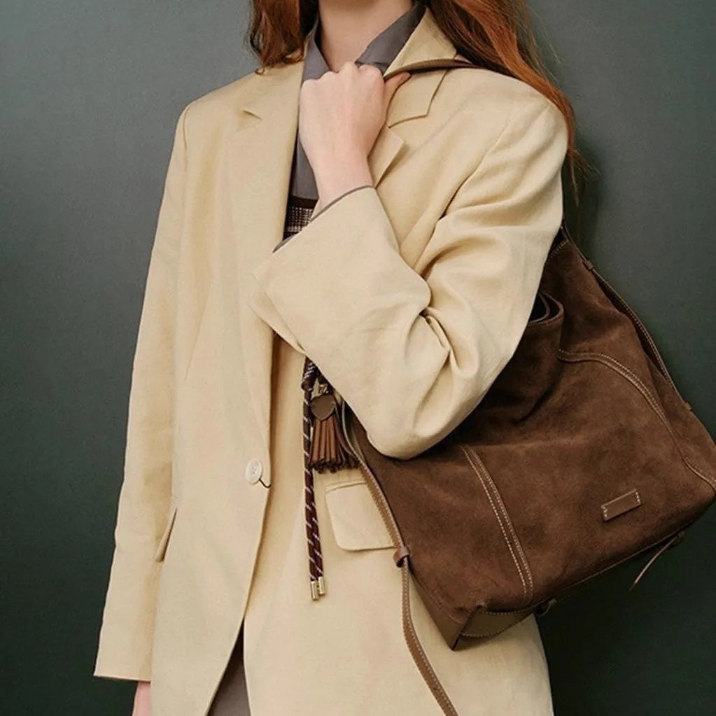 Large capacity deerskin velvet tote bag in Maillard coffee with sewing line details and crossbody strap