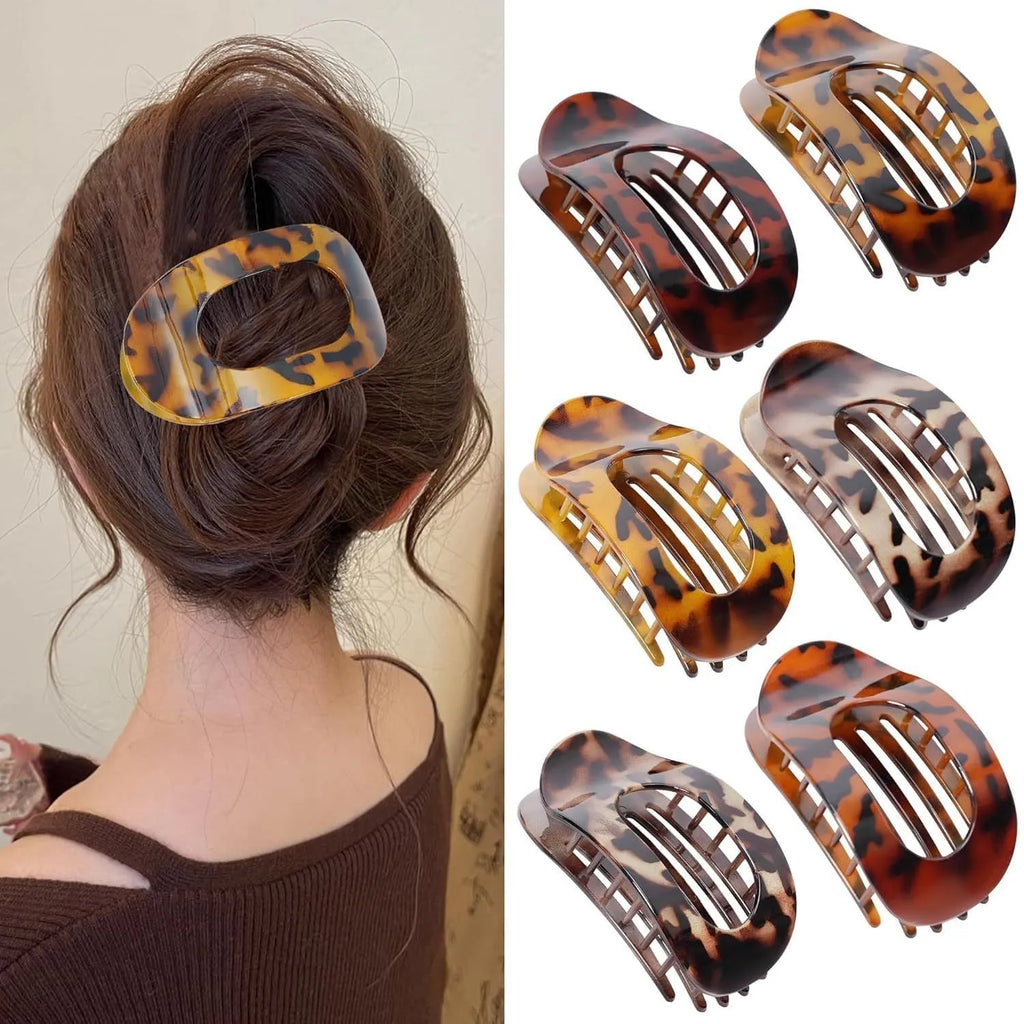 Six nude plastic hair clips with frosted finish and pointed toe quadrilateral design