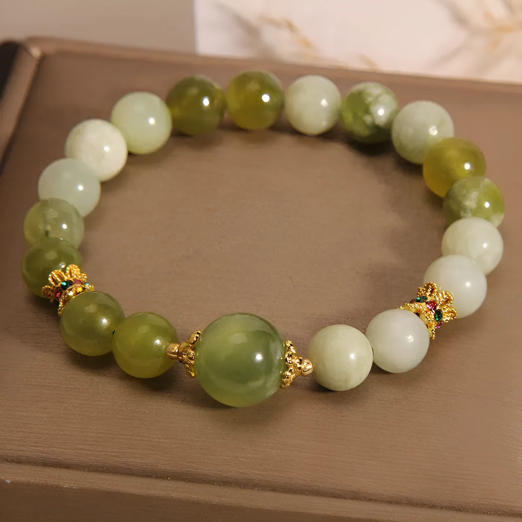 Women's jade bracelet in Xiuyan jade green colour with original design