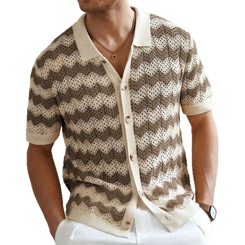 Short-sleeved yellow corrugated knit sweater with flocking detail on a hanger.