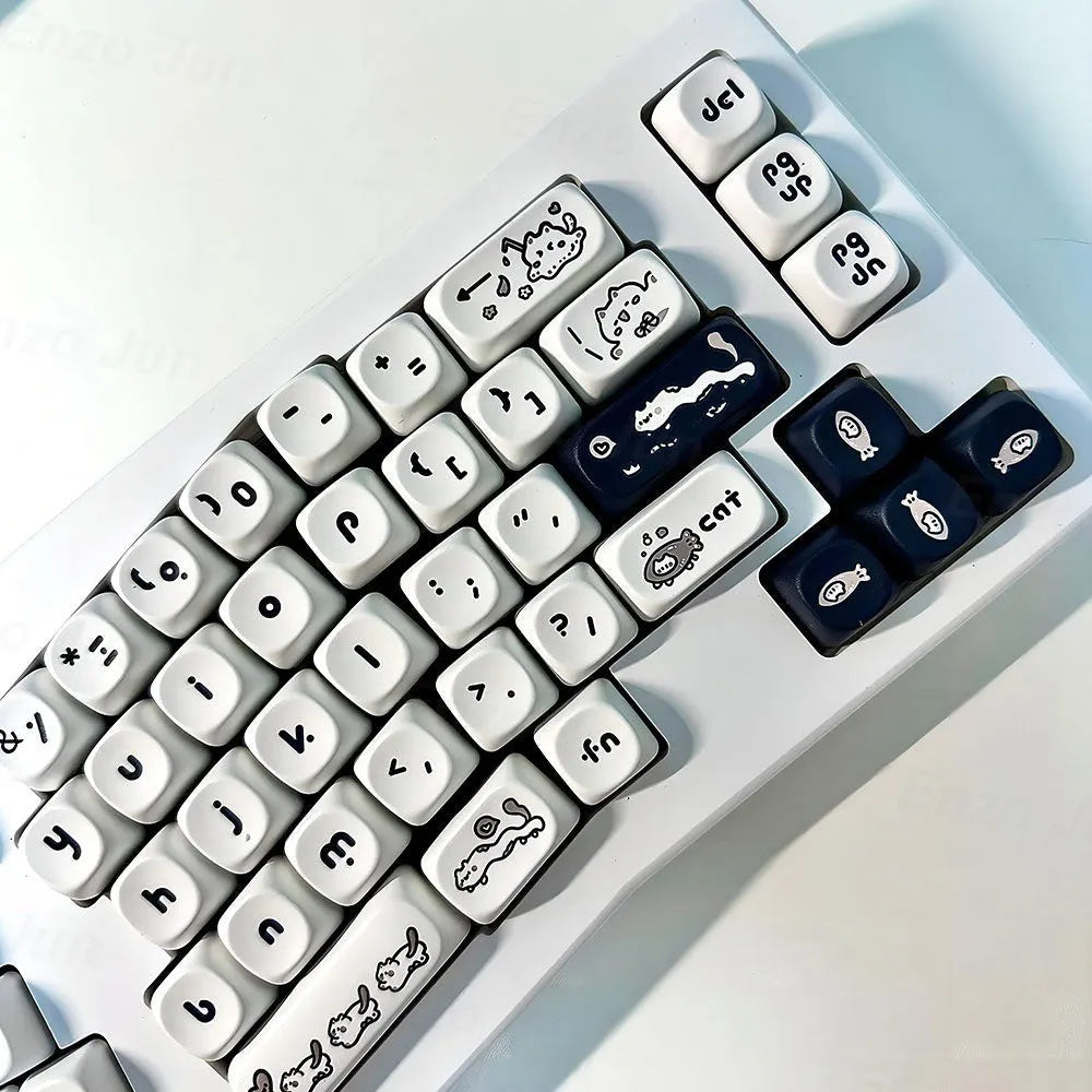 Black and white MOA height key cap set with kitten fantasy design on a mechanical keyboard