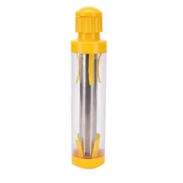 Yellow manual corn stripper thresher with stainless steel construction on a kitchen worktop.