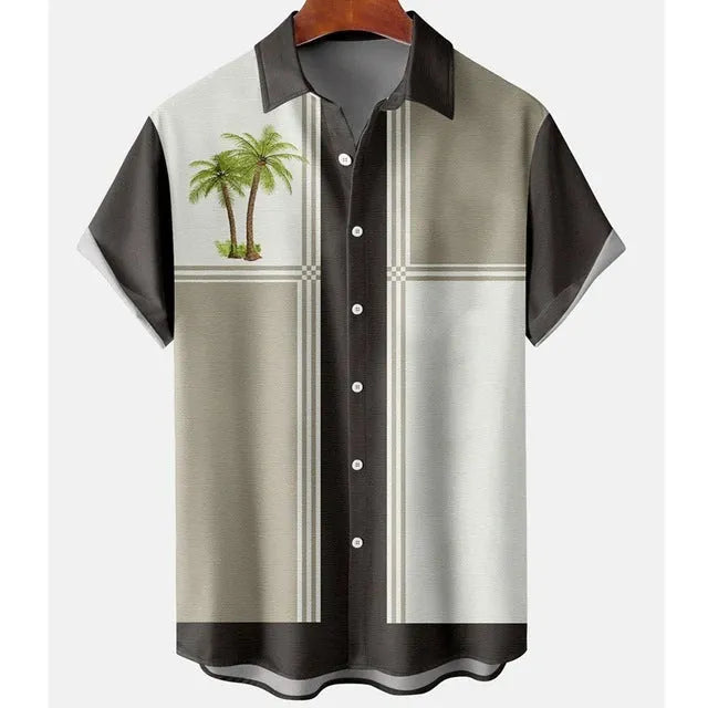 Man wearing a slim fit short sleeve shirt with a colourful 3D floral beach print.