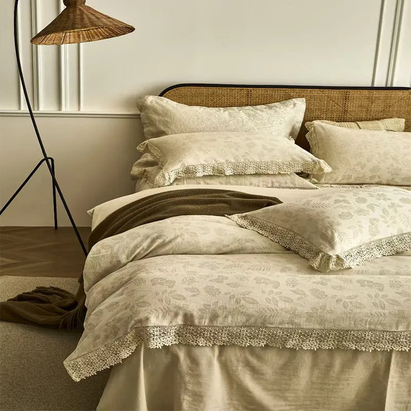 Cotton linen jacquard yarn-dyed washed four-piece bed sheet set in solid optic linen colour on a bed