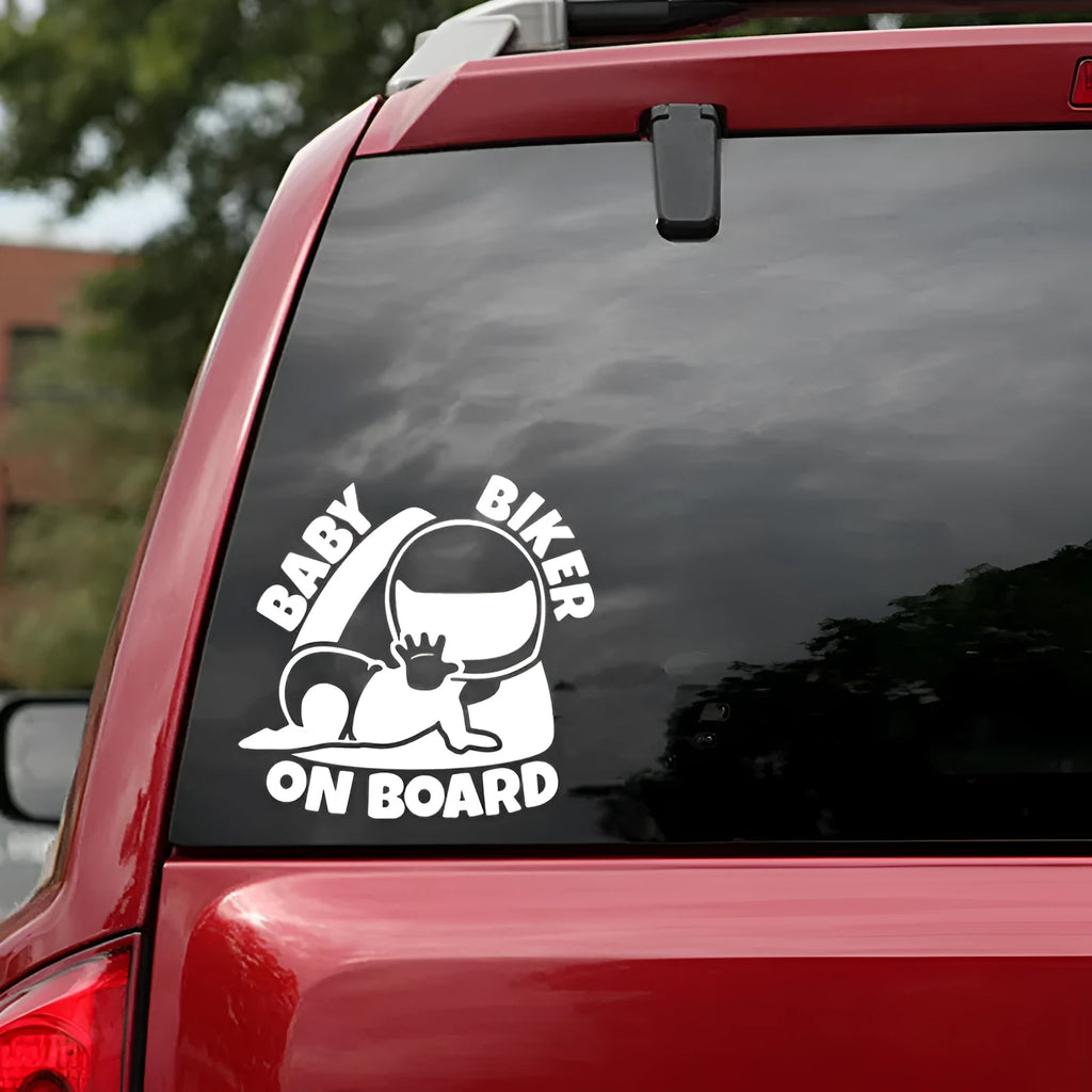 Black and white versions of a reflective BABY ON BOARD car sticker measuring 14.5 by 15 cm.
