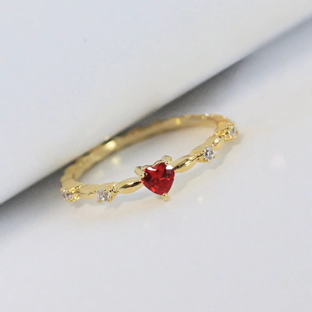 Women's peach heart shape ring with zircon details in gold or silver electroplated finish on copper
