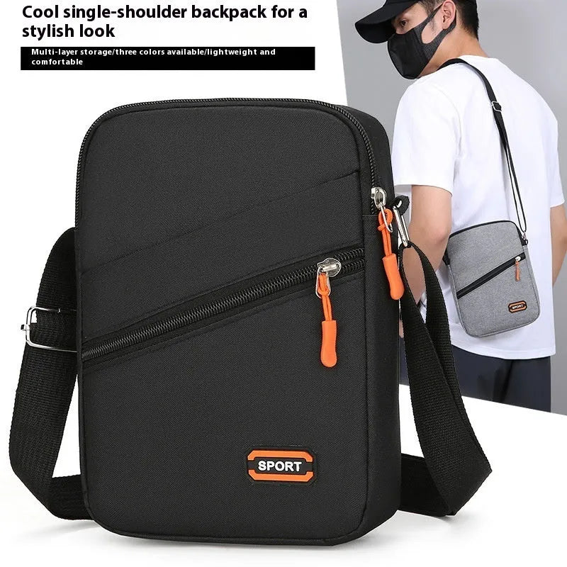 Ultra light Oxford cloth crossbody commuter bag in black, navy blue, or silver grey.