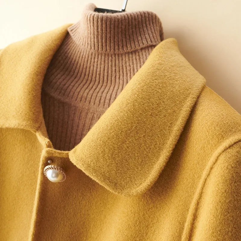 Women's wool double-faced coat with pearl buckle, mid-length, solid colour, long sleeves, black
