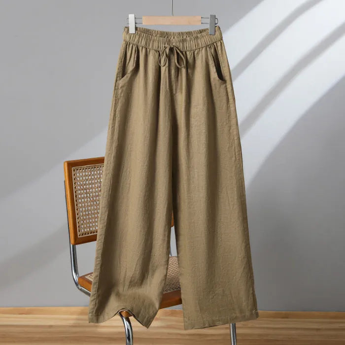 Women's straight leg casual trousers with a drawstring elastic waist in apricot colour.