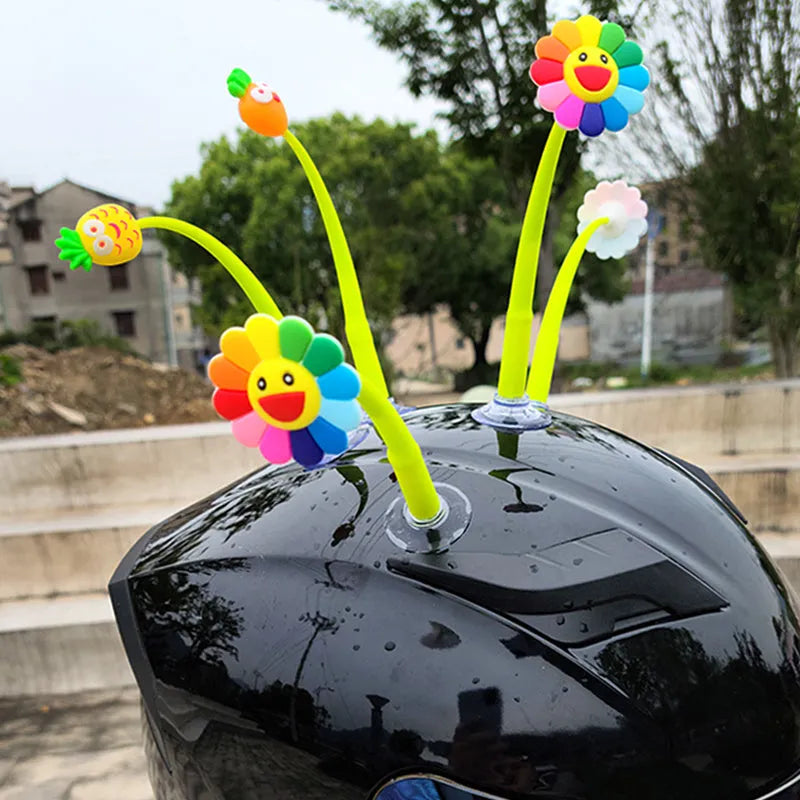 Silicone sunflower helmet decoration with suction cup attachment showing flexible stalk and petals