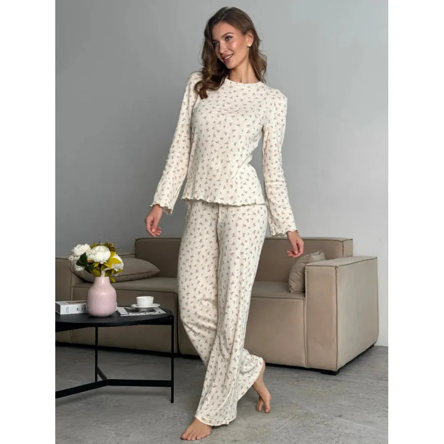 White floral print women's two-piece lounge suit with bell sleeves and wide-leg trousers