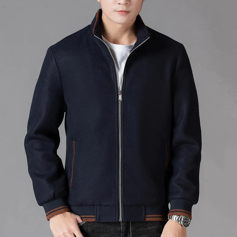 Men's grey polyester fleece jacket with zip pockets and long sleeves, shown on a hanger.