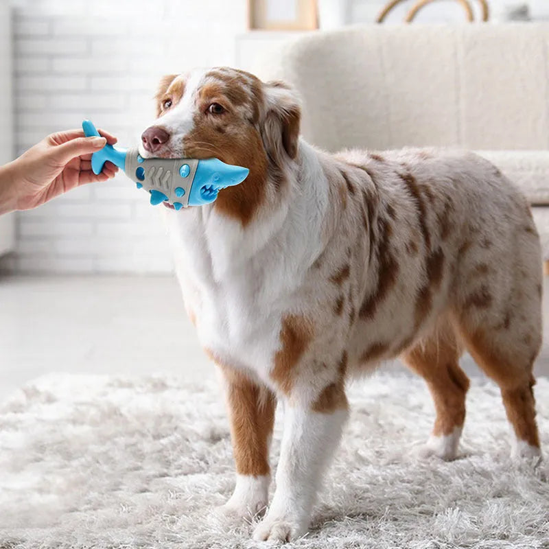 Blue leaky dog toy with shark-tooth texture for teething and dental cleaning