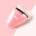 Mini portable eyelash curler in white with silicone pad and stainless steel arm