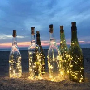 Flexible copper wire LED string light with bottle stopper for wine bottle decoration.
