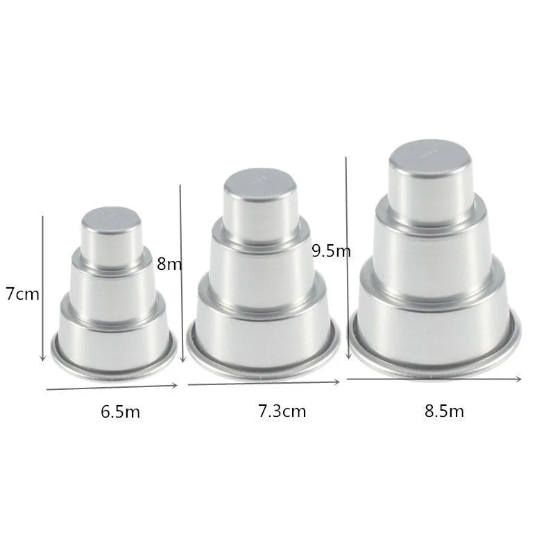 Set of three silver aluminium alloy cake moulds in large, medium, and small sizes for layered desserts.