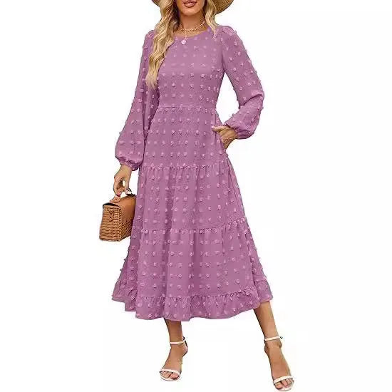 Beige women's high waist long sleeve dress with ruffle sleeves on a mannequin.