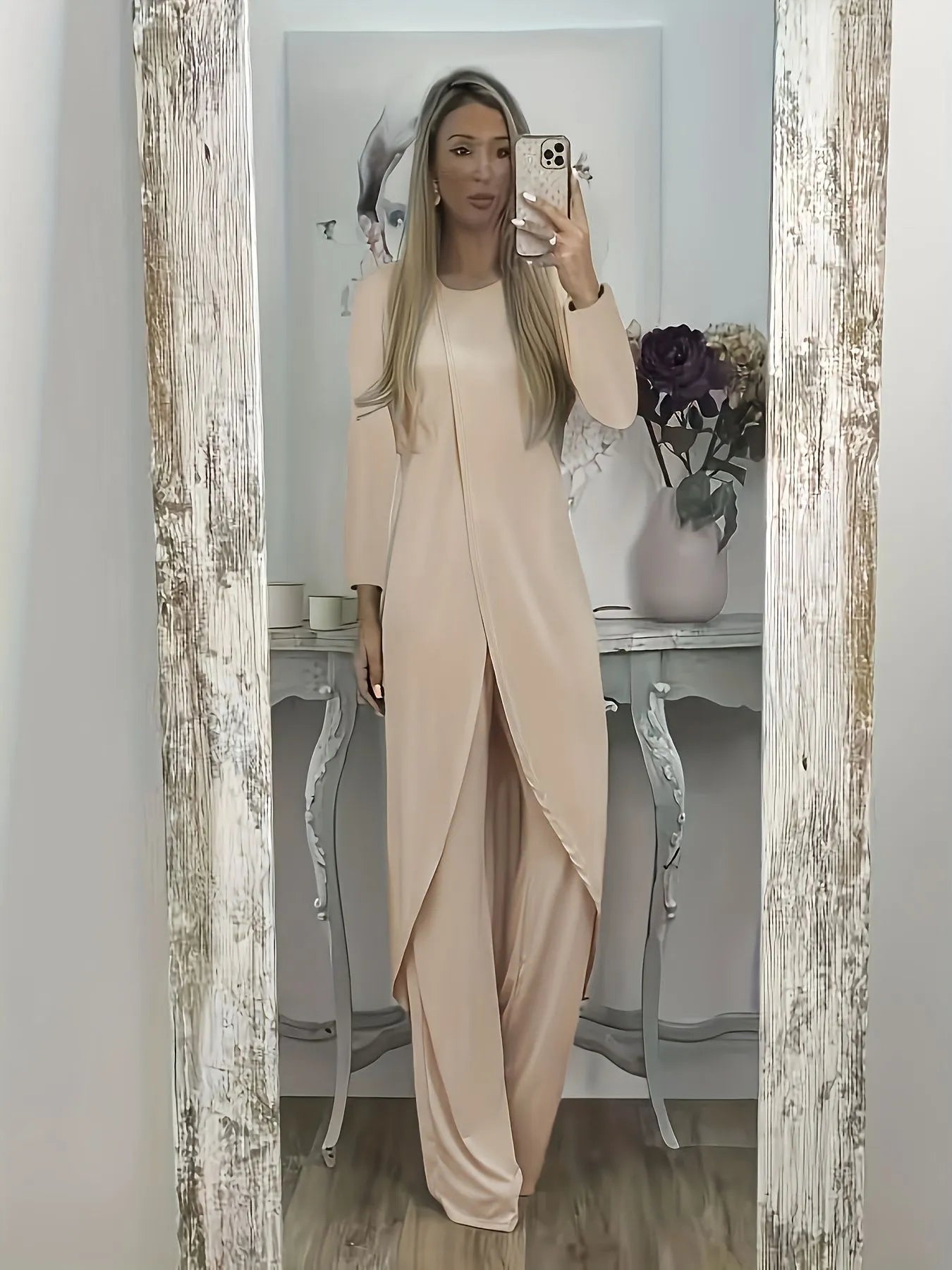 Loose fit casual tracksuit set in black, featuring a long sleeve round neck top and matching trousers
