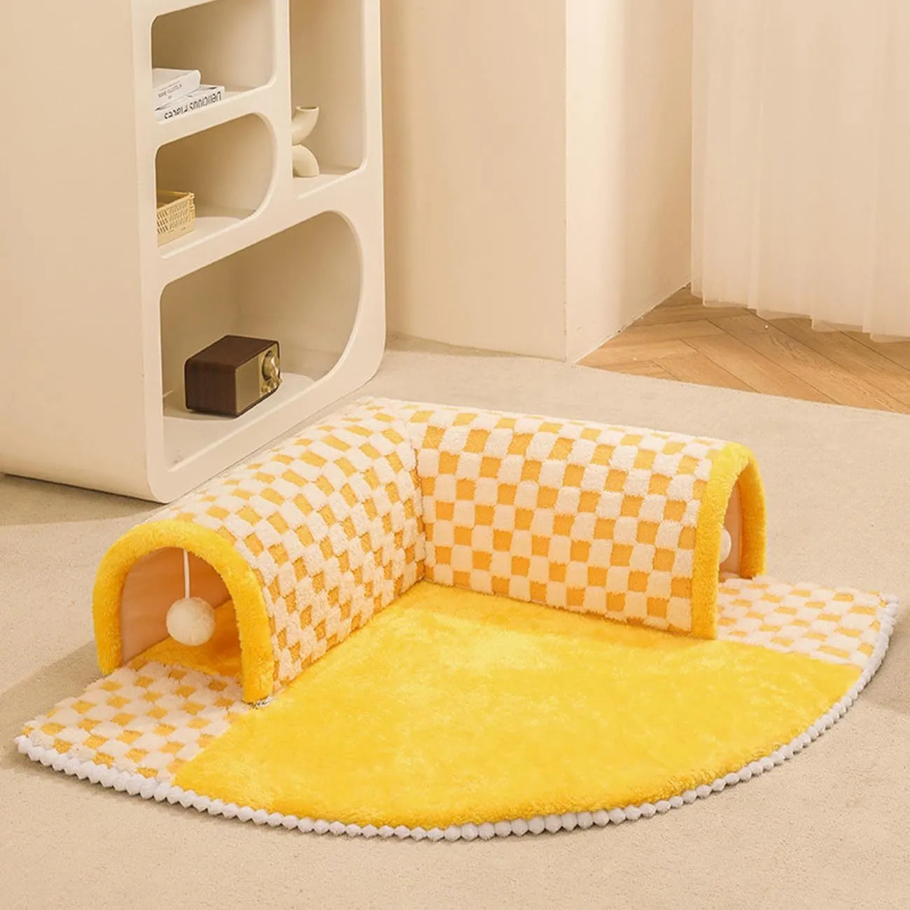 Fan-shaped plush pet bed with integrated tunnel in coffee colour, showing thick mat and anti-slip base.