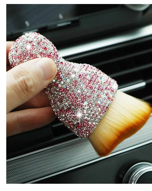 Compact white PVC car interior cleaning brush for dusting dashboard and vents.