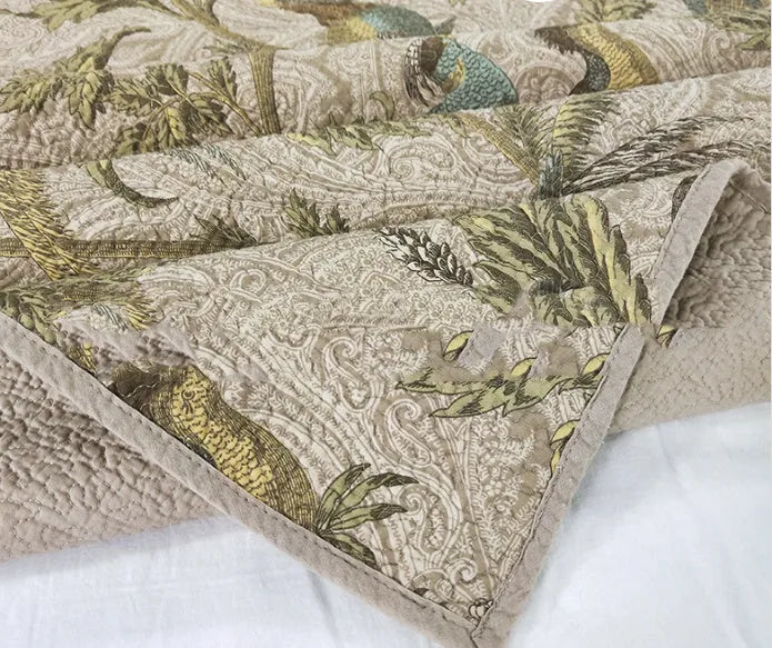 Blue American flower and bird pattern cotton bedspread quilted set with three pieces on bed