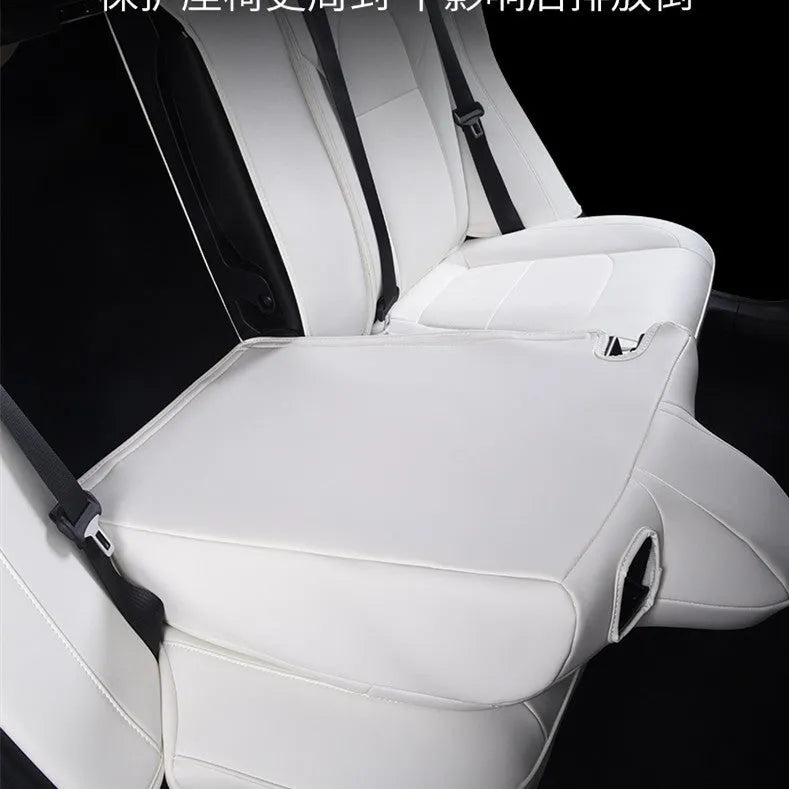 Tesla Model 3 and Y car seat cover interior package in black and white binding style.