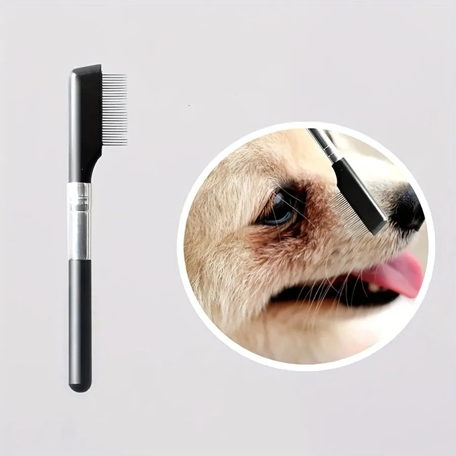 Black dual-ended pet grooming brush with soft brush and comb on a white background.