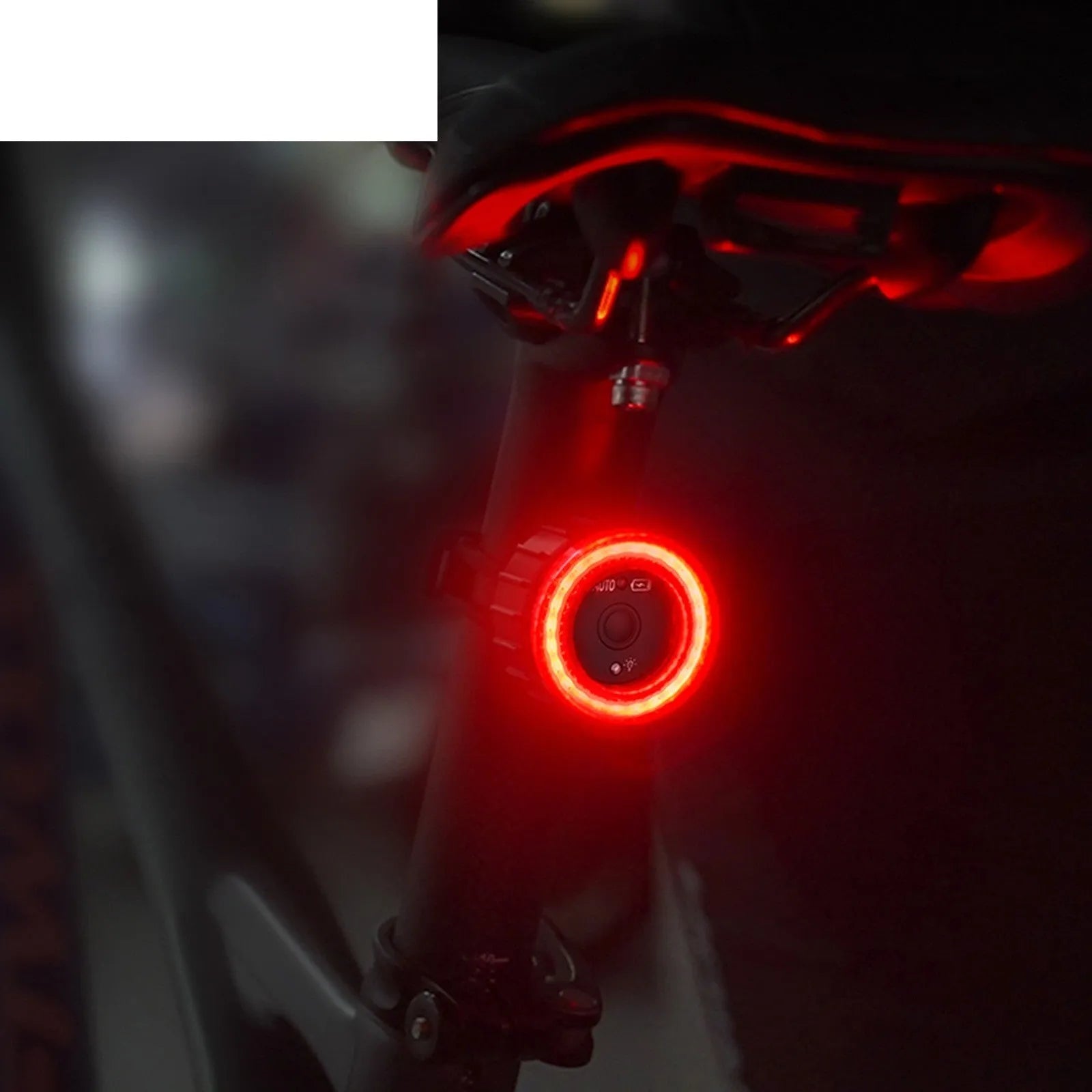 Black intelligent bicycle brake taillight with aluminum alloy frame and seat tube bracket.