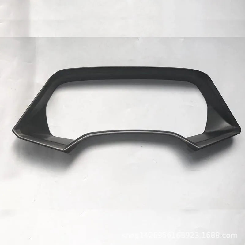 BMW X5 dashboard decorative frame in ABS plastic with carbon fibre or peach wood finish