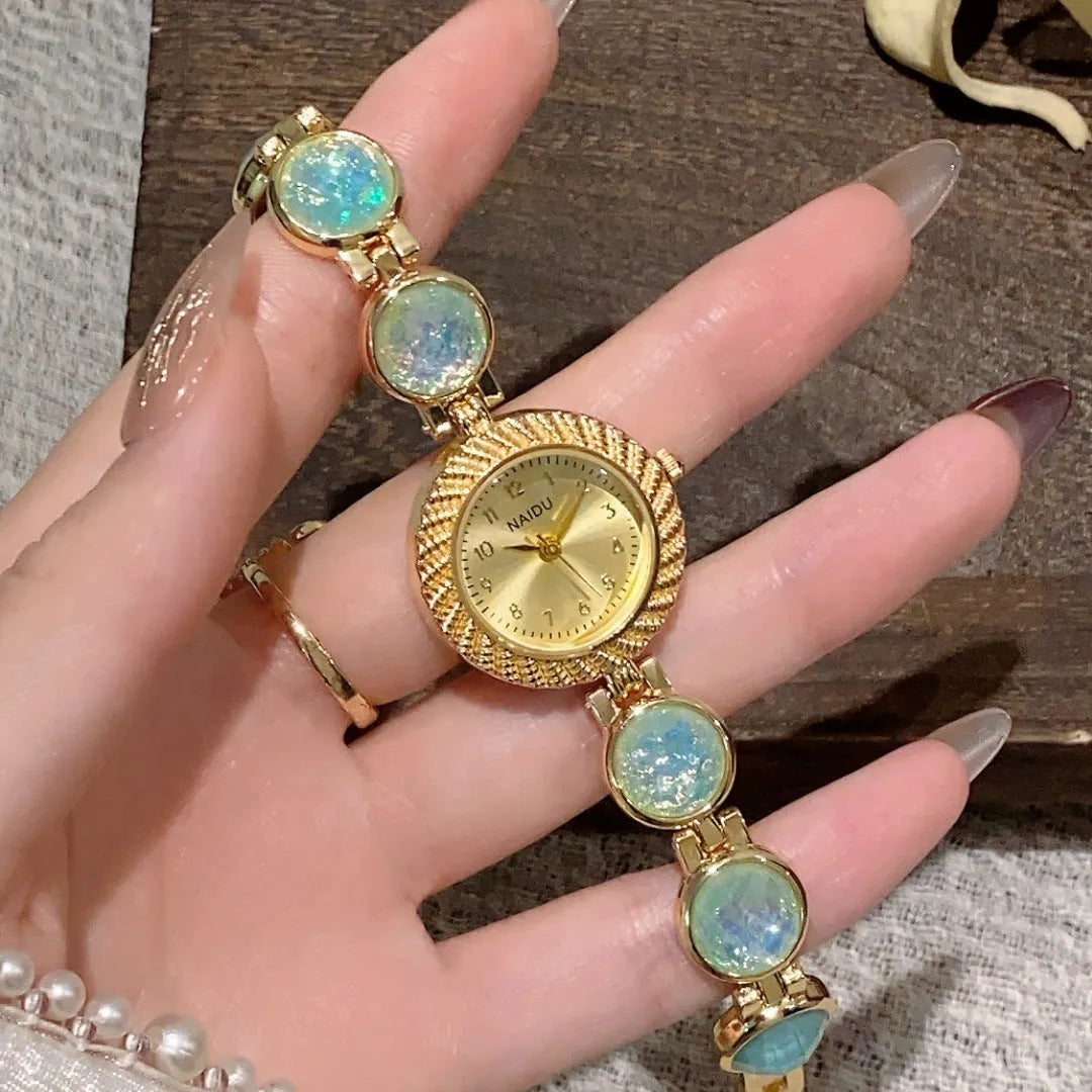 Women's round 25mm quartz watch with zinc alloy case in one of six colour options.