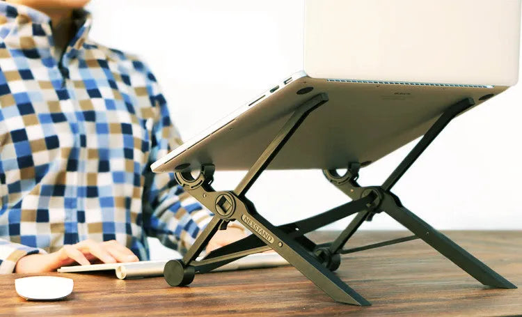 Black folding portable laptop stand made of reinforced nylon, shown in open and closed positions.