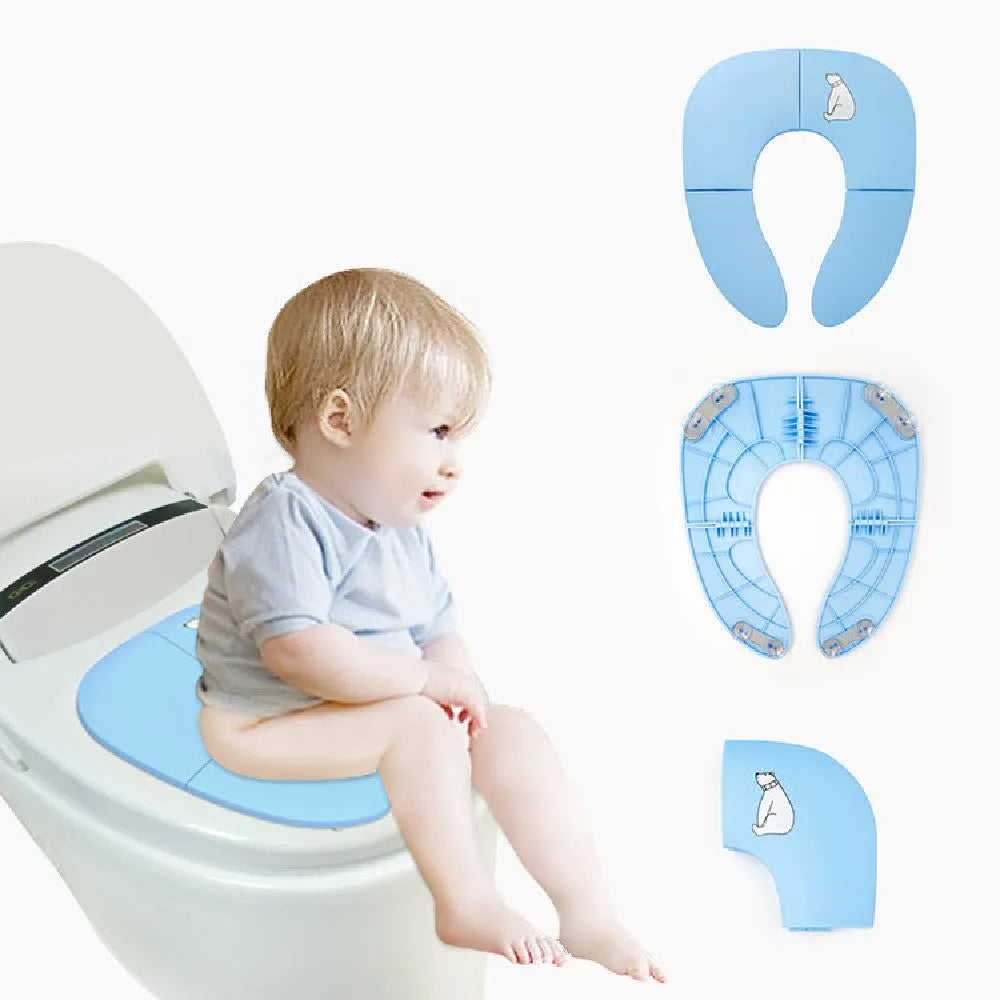 Foldable baby travel potty seat in pink, yellow, blue colours on white background