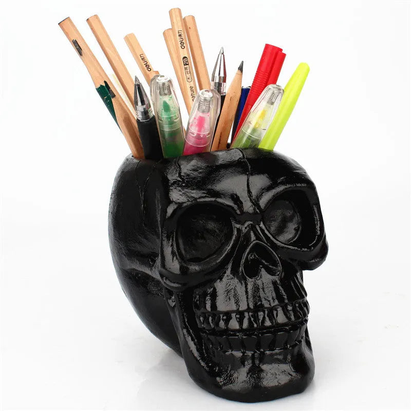 Skull head resin storage tube in black, 11x15x11cm, with brain-shaped interior
