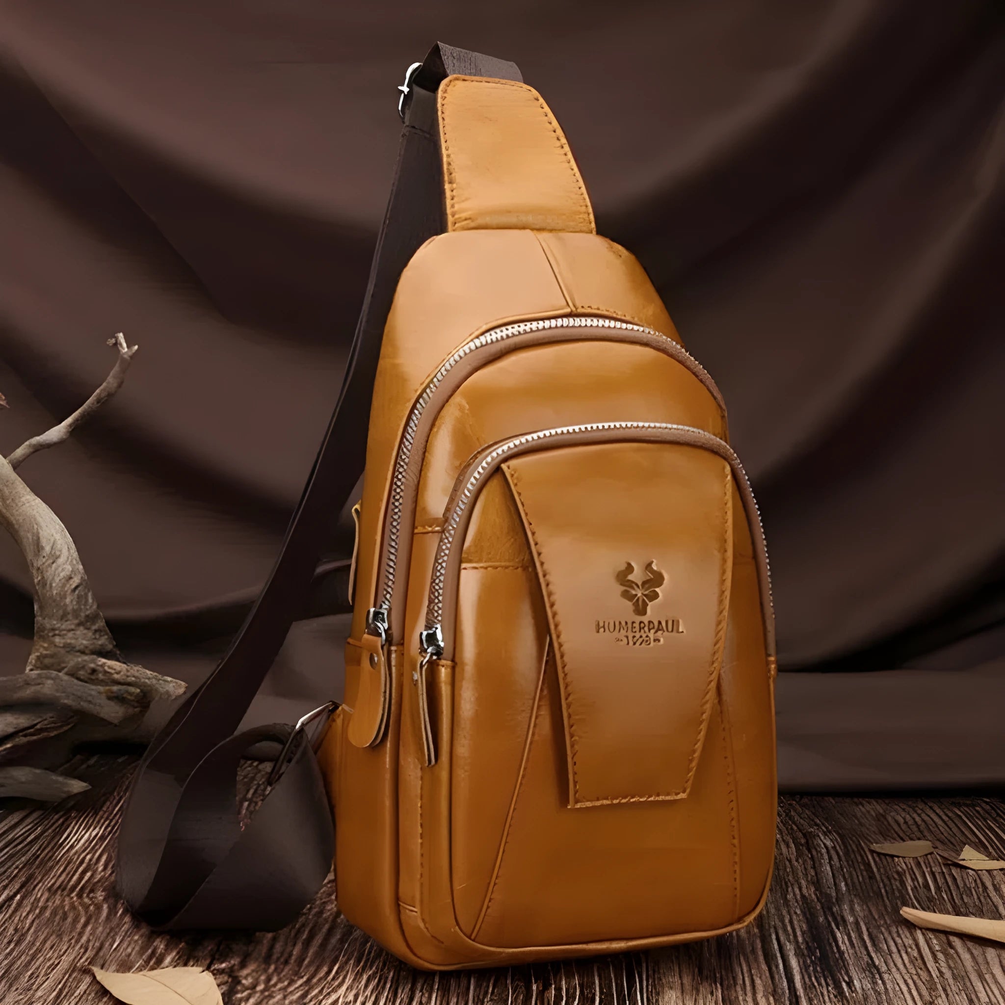 Men's full-grain cowhide single-shoulder bag in dark brown with stitched detailing and solid colour finish